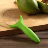 Cortador de aguacate con mango en abs